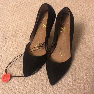 NWT suede black pointed toe heels.